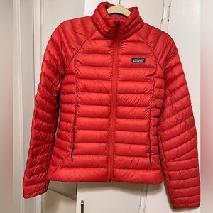 Red/orange Patagonia women’s down sweater. Excellent condition